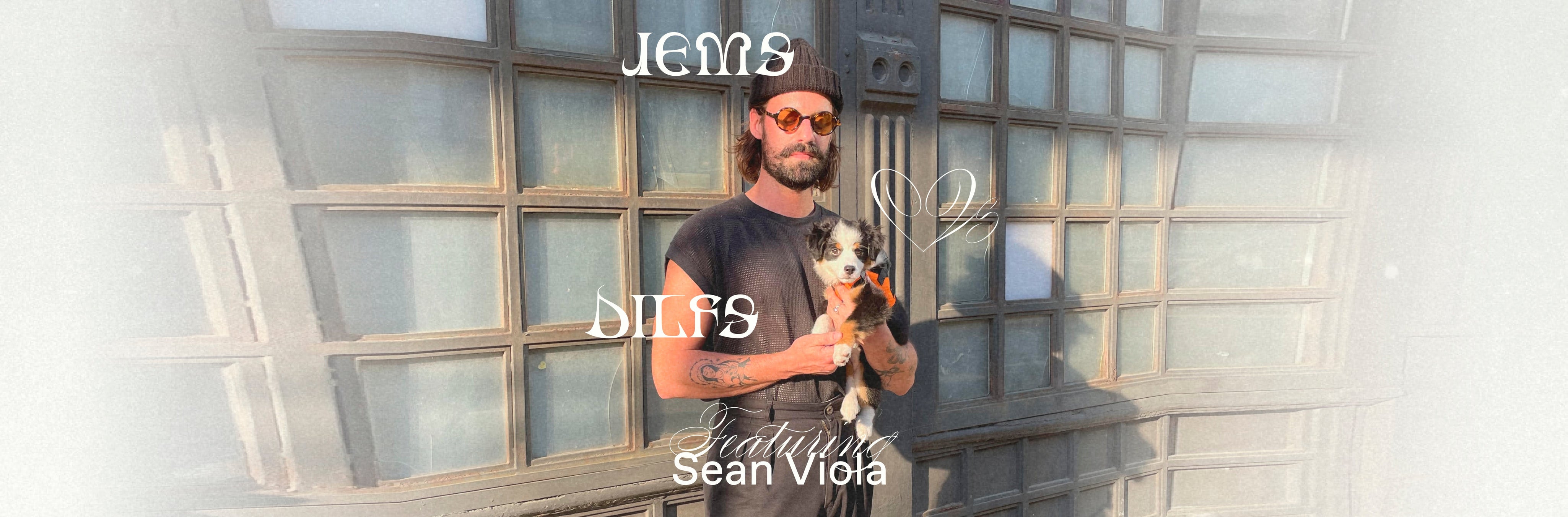 Sean Viola holding his dog Pixie